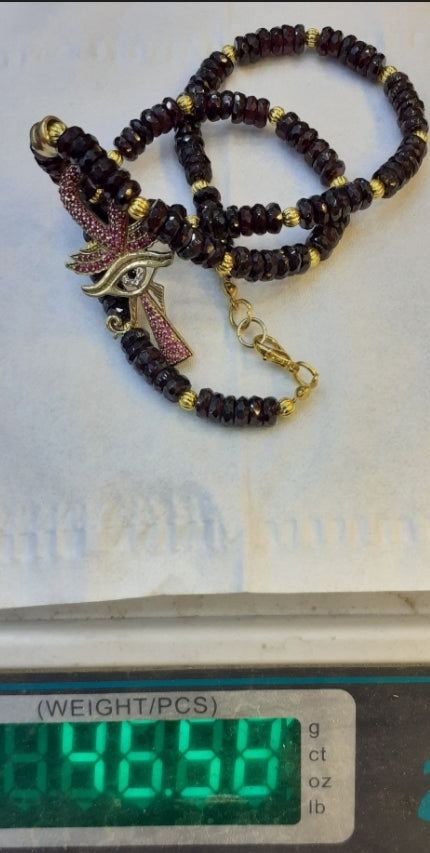Necklace Ruby discs with pendant Ankh and Eye of Horus